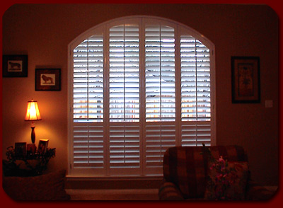 image of arch white shutters